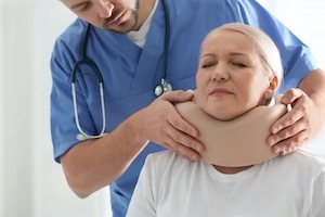 Woman with neck injury